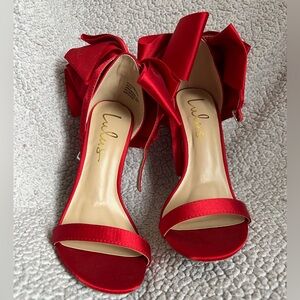 NWOT!! Red Lulu heels size 6. Never worn.